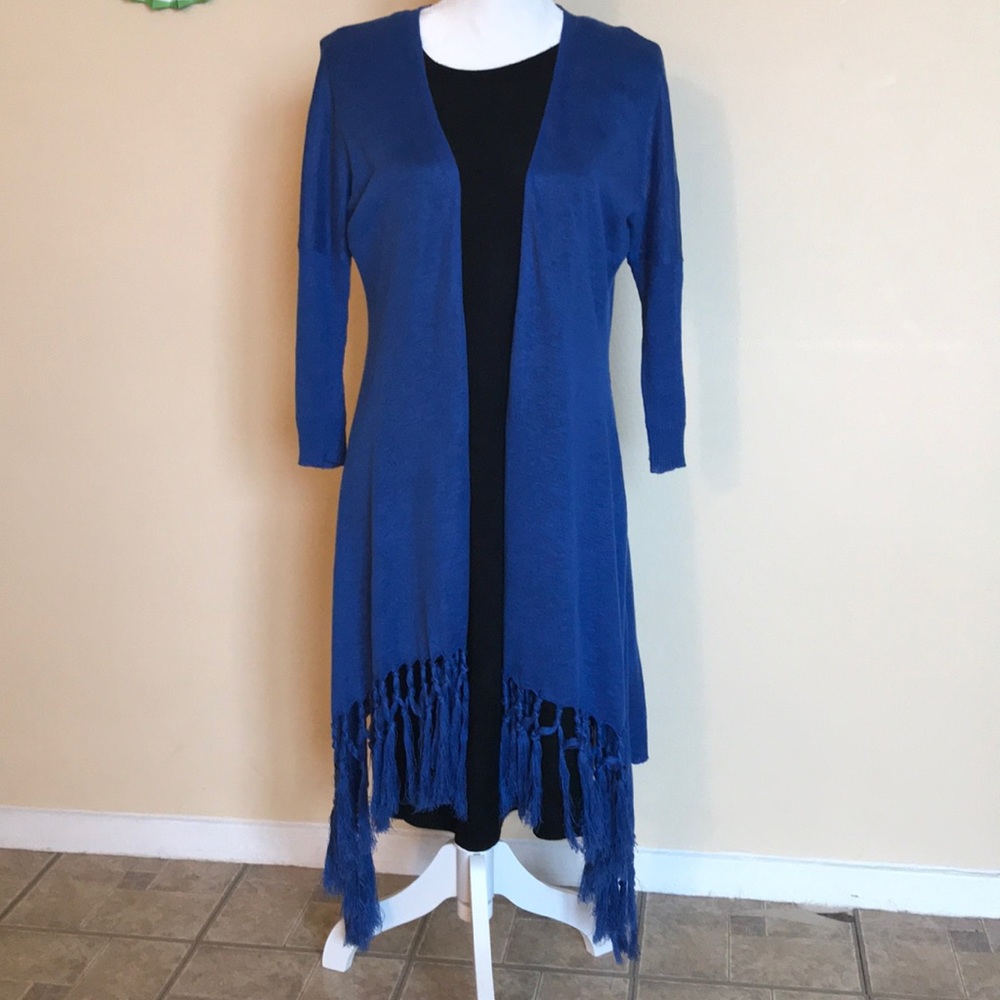 A blue cardigan